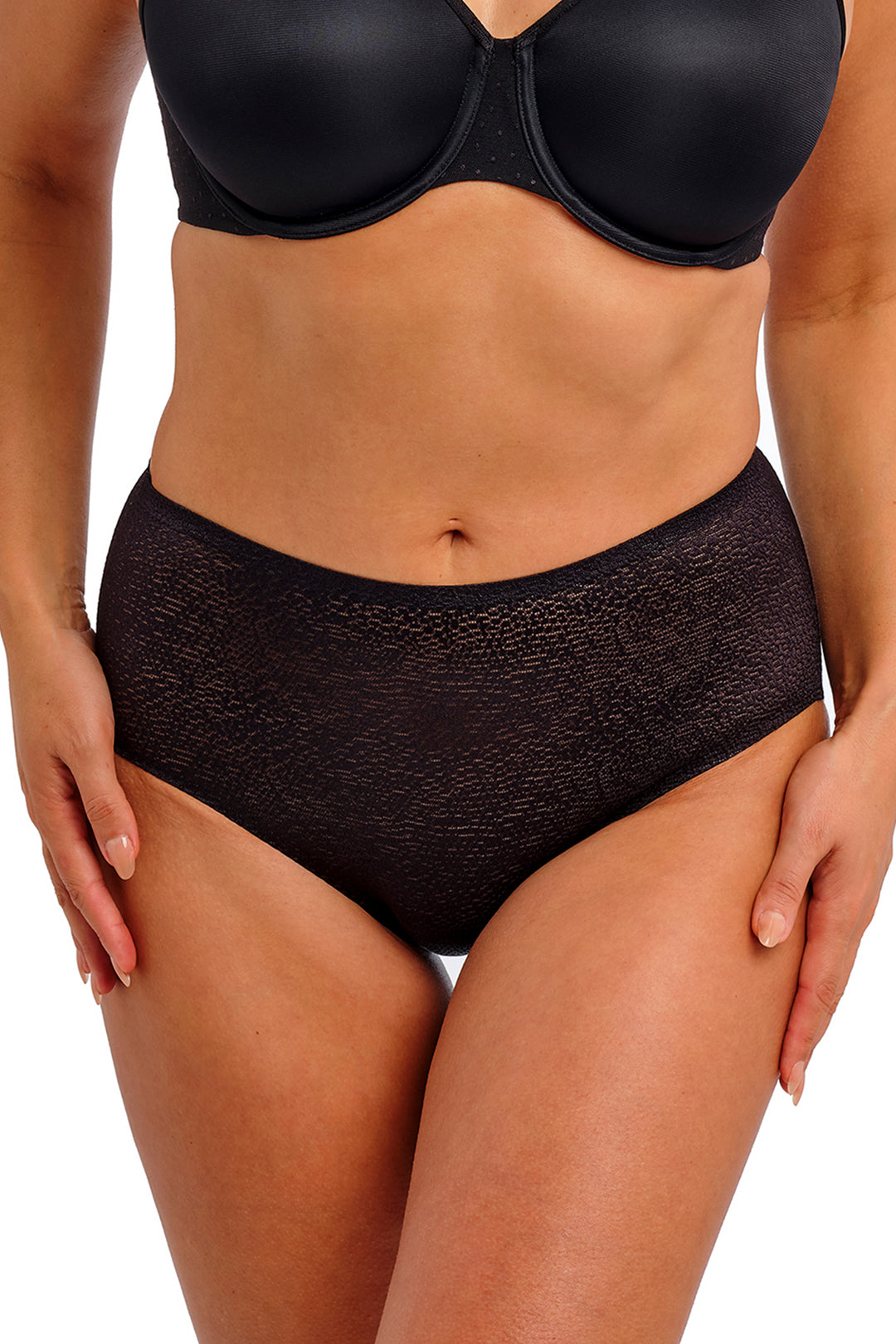Black bra and high-waisted underwear set on a neutral background