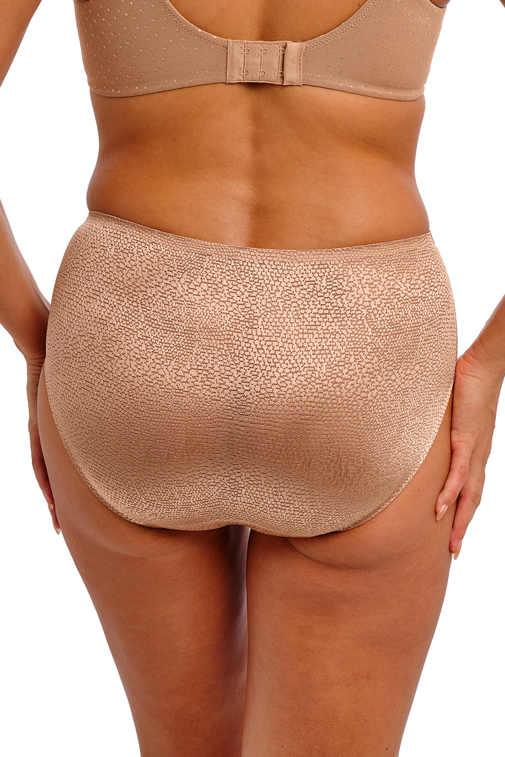 Beige shapewear being worn on a white background