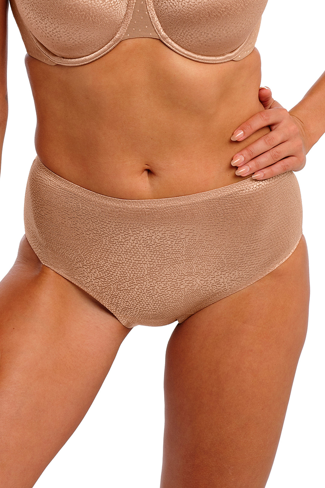 Beige bra and panties set on a white background