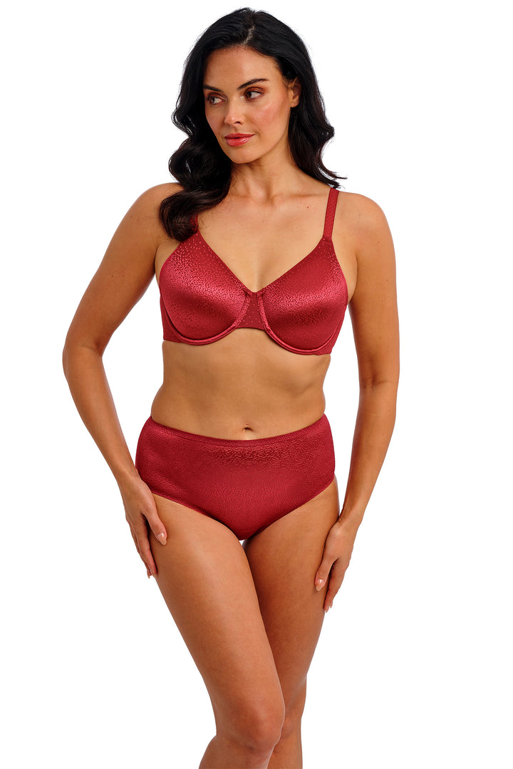 Woman wearing a red bikini set on a white background