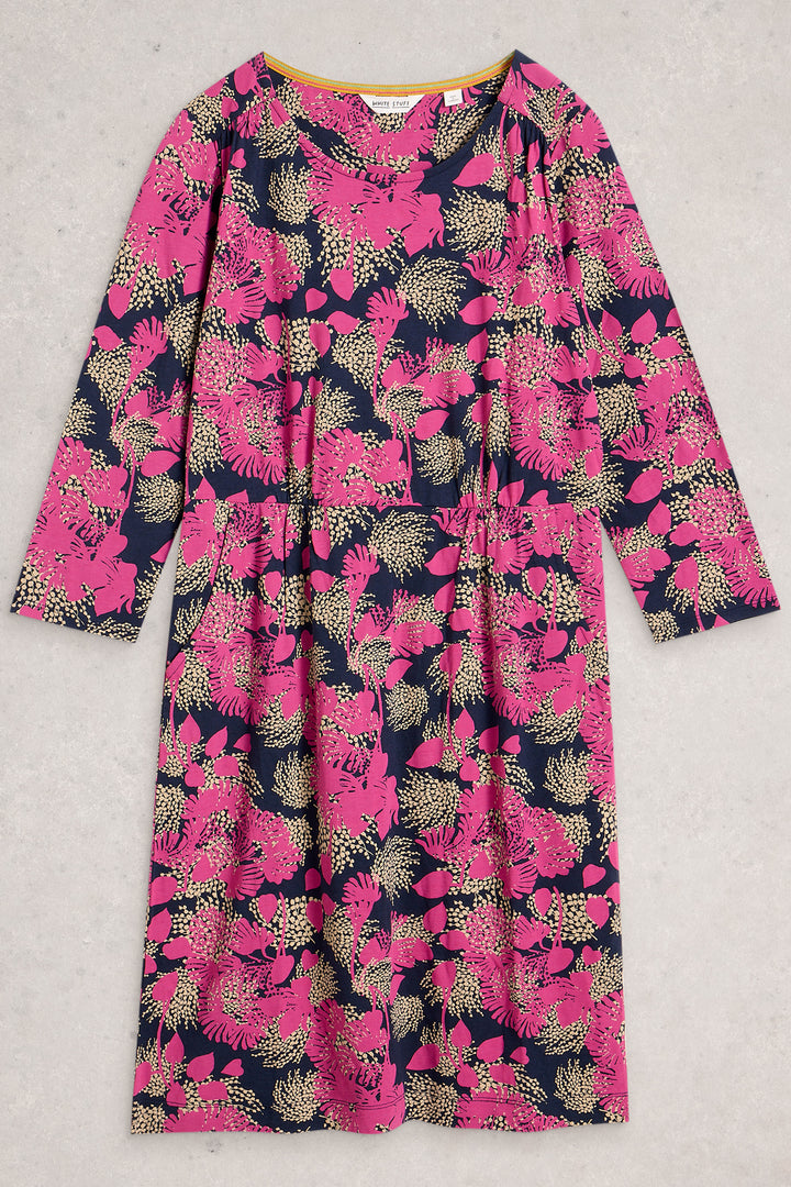 Pink and navy floral dress on a light gray background